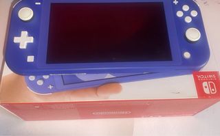 Nintendo Switch Lite e accessori.