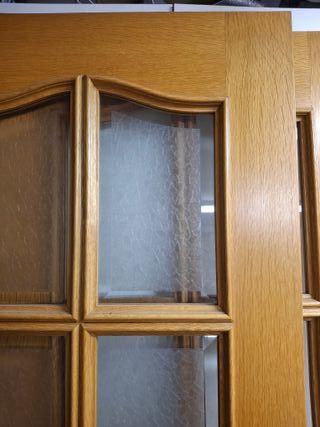 Puerta doble roble y cristal