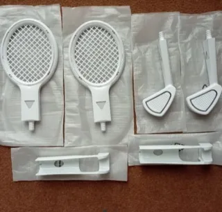 Wii NUEVO. 2 Raquetas+2 Palos Golf 'Con luz'