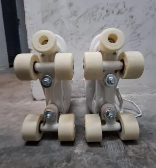 Patines Oxelo 4 ruedas niña T35 con protecciones.
