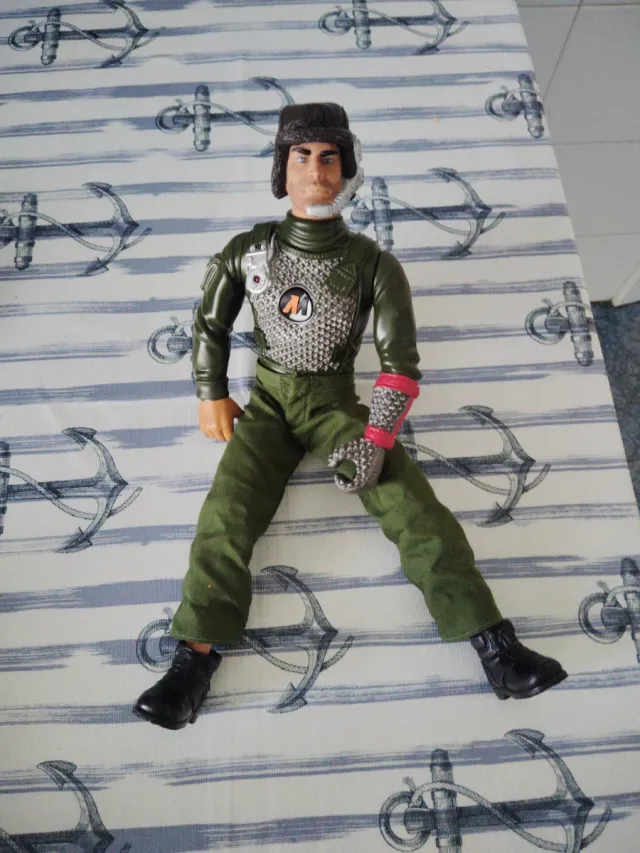 Muñeco de accion Action Man + Bicicleta