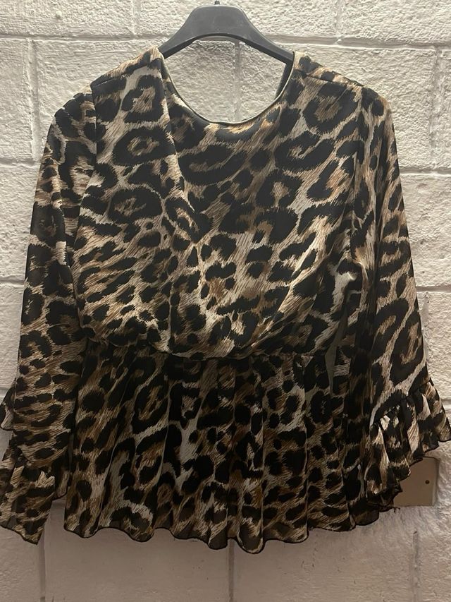 Blusa leopardata a portafoglio