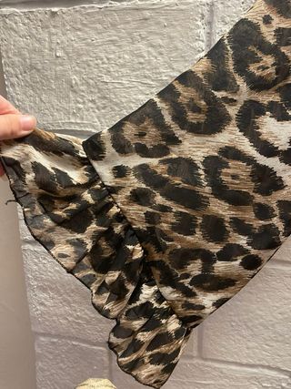 Blusa leopardata a portafoglio