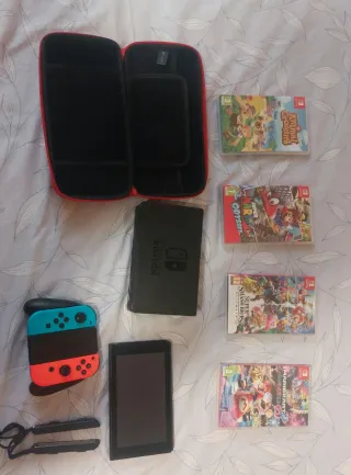 Nintendo Switch + 4 Juegos + Accesorios