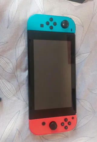 Nintendo Switch + 4 Juegos + Accesorios