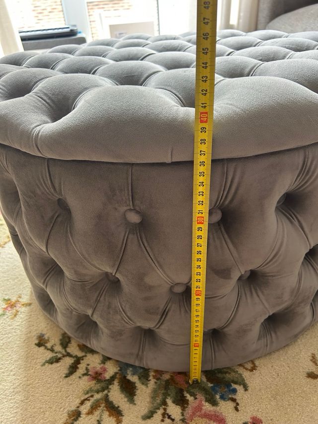 Puf redondo gris con almacenaje