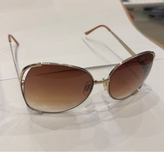 Gafas de sol mujer montura dorada