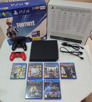 PS4 con caja original + 6 Juegos + 2 mandos