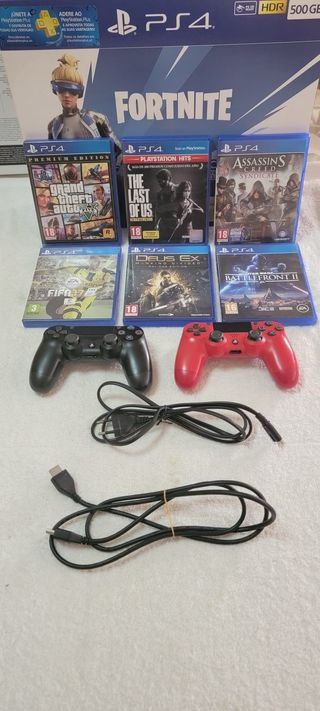 PS4 con caja original + 6 Juegos + 2 mandos