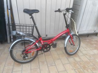 Bicicleta plegable roja como nueva