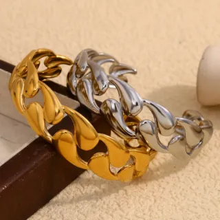 Conjunto deBrazaletes de eslabones oro y plata