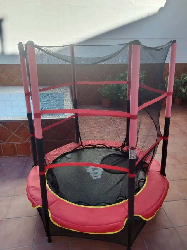 Cama elástica infantil con red de seguridad