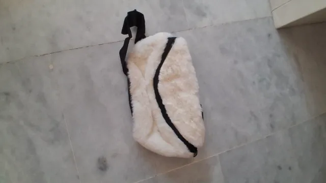 Riñonera pelo blanco