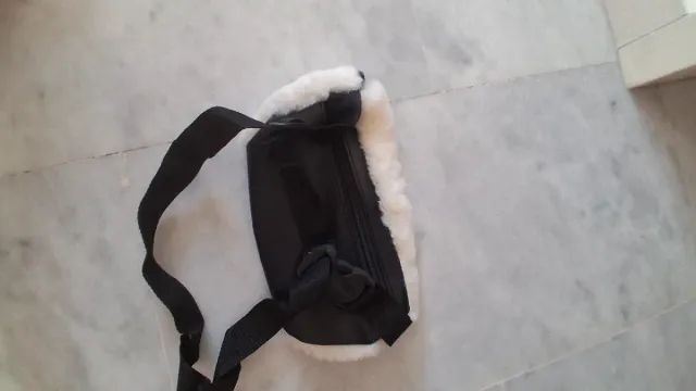 Riñonera pelo blanco