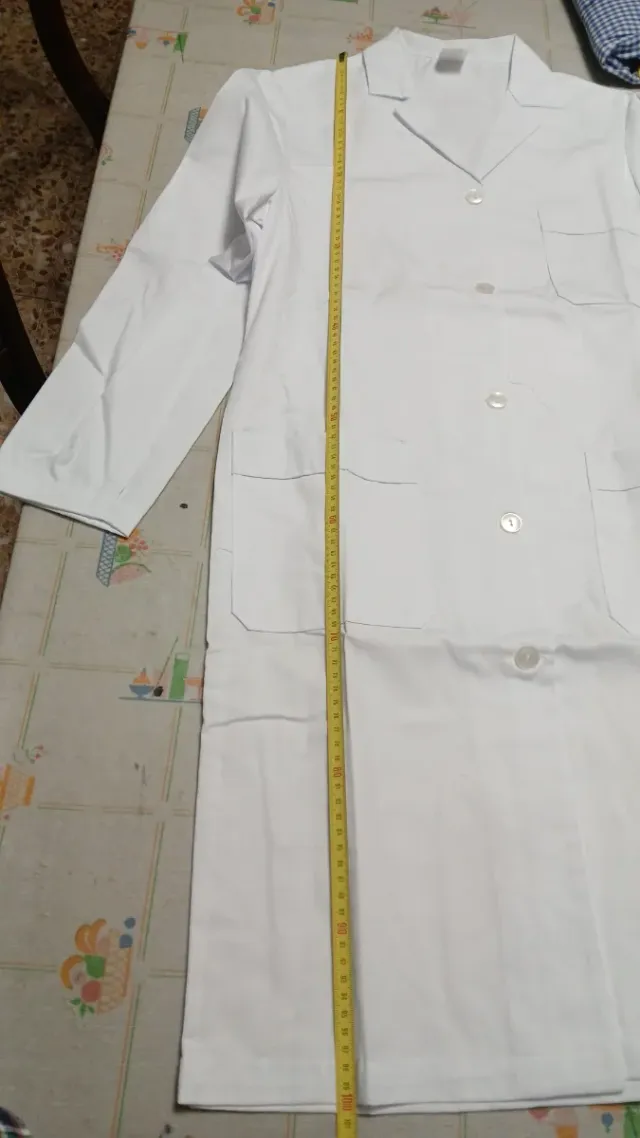 Bata blanca,manga larga.Varias tallas SIN USAR