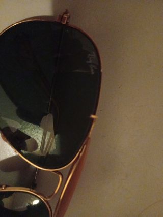 Gafas de sol Ray-Ban doradas y verdes