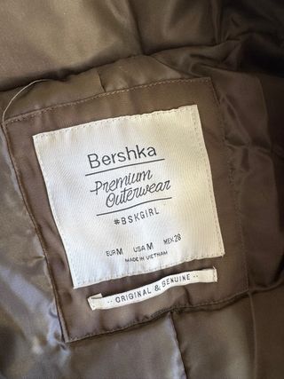 Parka verde con capucha y pelo