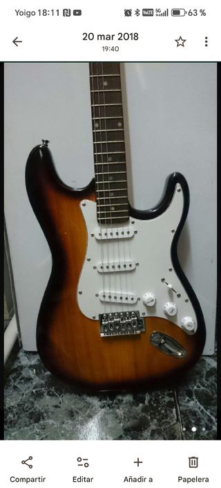 Guitarra eléctrica con amplificador