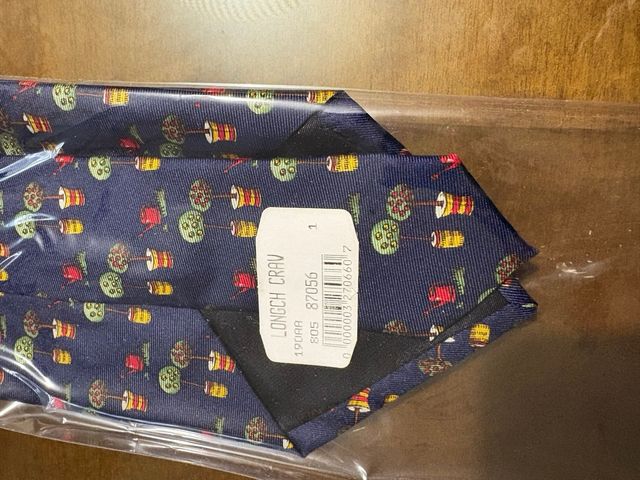 Cravatta blu Longchamp con disegni