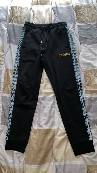 Tuta Fendi nera con dettagli oro