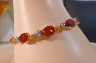 Pulsera cobre con piedras rojas y doradas