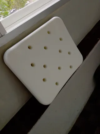 Silla de ducha con asas