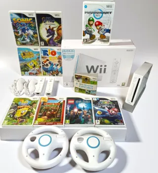 Wii pack + Mandos + juegos + volantes 