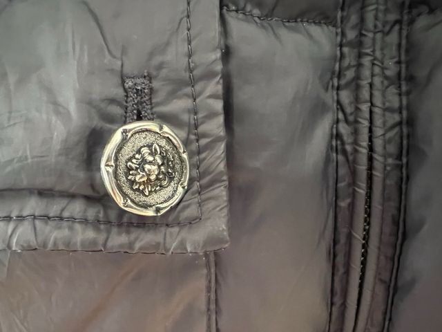 Abrigo de plumas para niño. Tizzas. Talla 16.