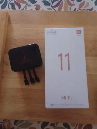 Móvil y Auriculares Bluetooth Negros