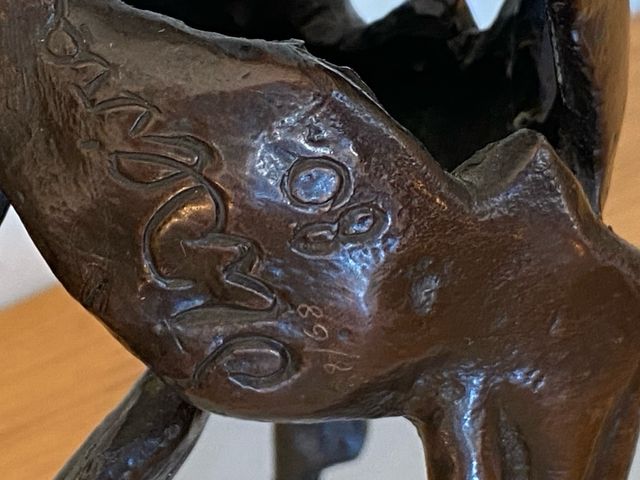 Scultura d'oliva. Cavallo in bronzo