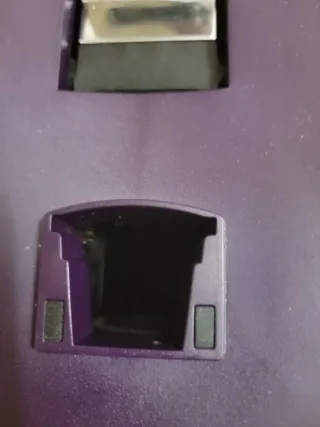 Cafetera de cápsulas morada