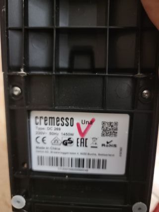 Cafetera de cápsulas morada