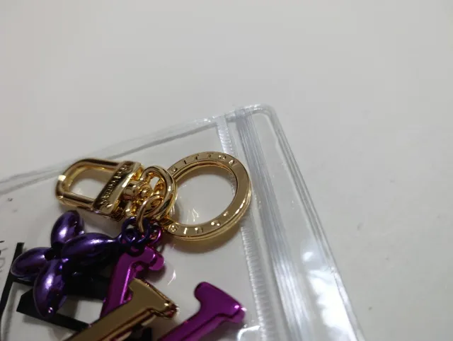 Llavero Louis Vuitton Flor y Letras LV