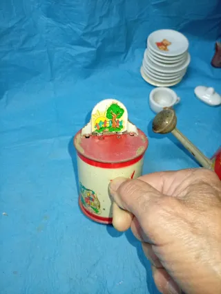 Giocattoli: annaffiatoio, lavatrice, sonaglio