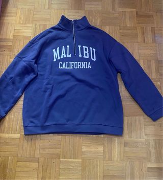 Sudadera rosa con texto en mangas 10€ cada  una