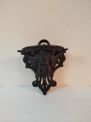 Staffa in ferro battuto con faccia