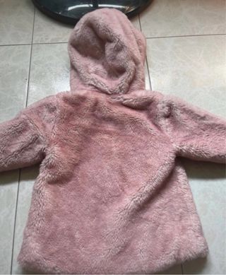 Pelliccia rosa con cappuccio