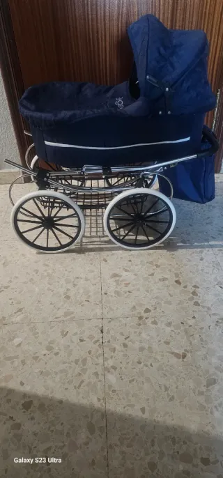 Carro de muñecas tipo inglésina