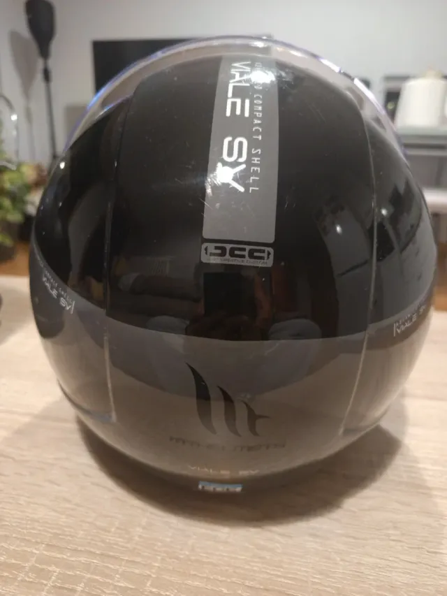 Casco de moto negro con visera
TallaM