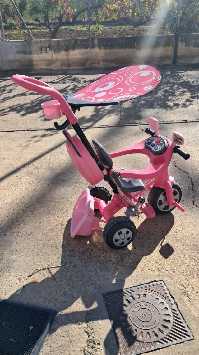 Triciclo evolutivo rosa con capota