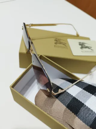 Gafas de sol Burberry doradas y marrones