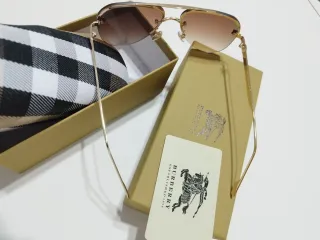 Gafas de sol Burberry doradas y marrones