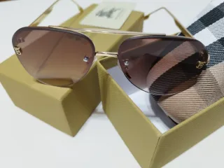 Gafas de sol Burberry doradas y marrones