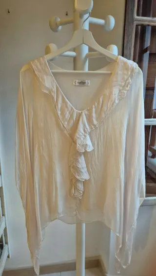 Blusa rosa clarito con volantes talla única