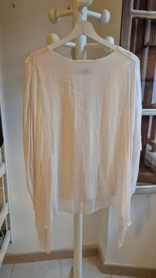 Blusa rosa clarito con volantes talla única