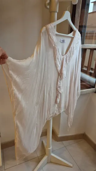 Blusa rosa clarito con volantes talla única