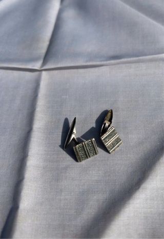 Gemelos plateados cuadrados