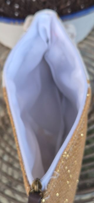 Bolso de mano tela tipo saco y brillantina.