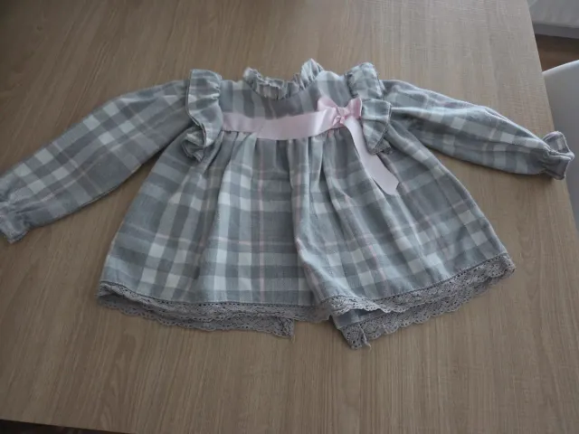 Camisa de bebé a cuadros con lazo rosa