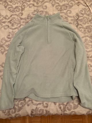 Jersey verde de cuello alto con cremallera